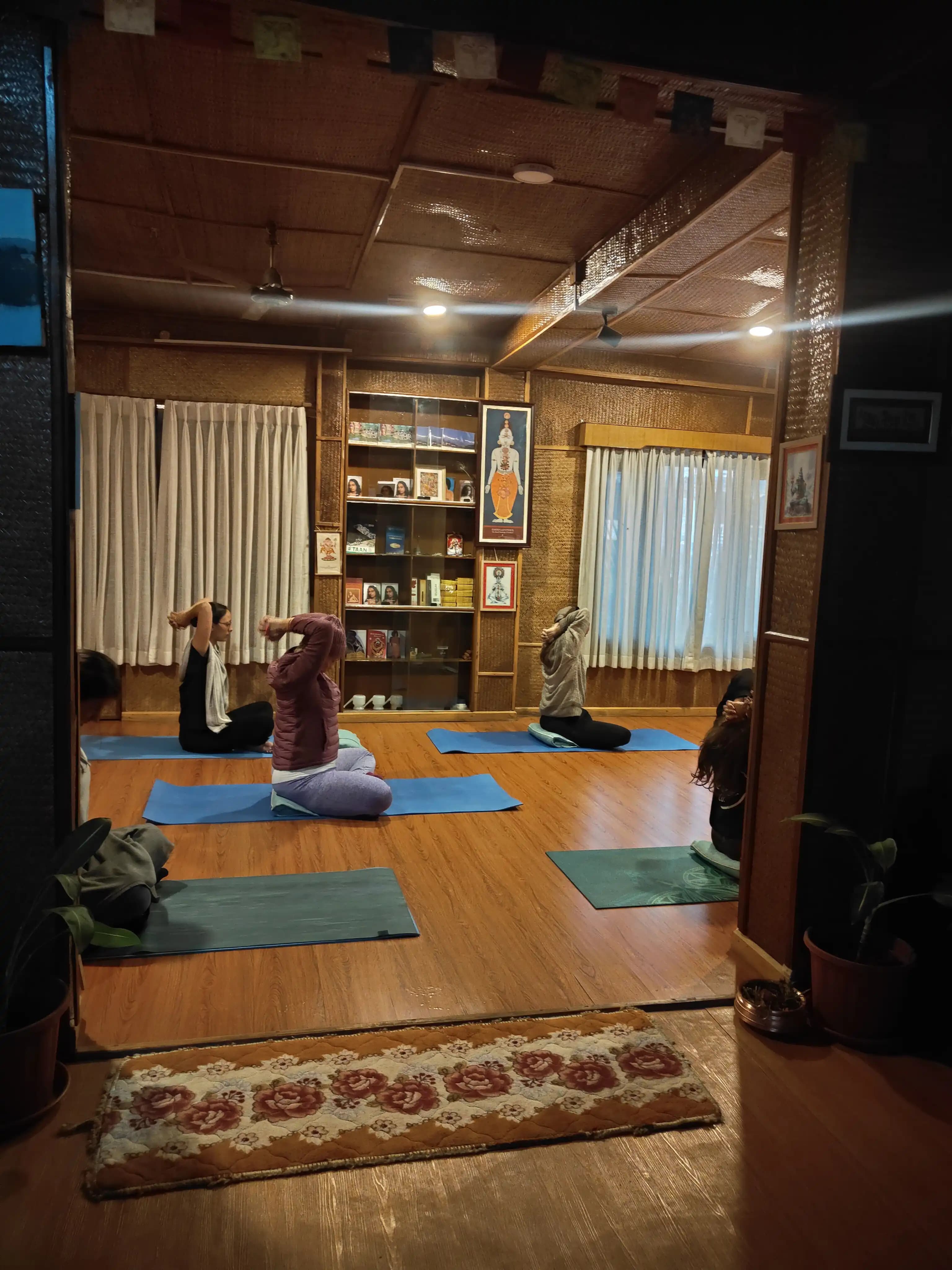 Sunrise yoga practice at our Pokhara retreat center